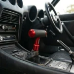 Momo T-Shape Gear Shift Knob with Textured Rubber Grip and Aluminum Collar | Universal Manual Transmission Shifter Knob in Red and Blue - Image 5